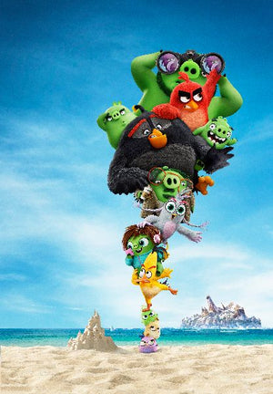Angry Birds-figurer som balanserar i ett torn på en sandstrand