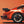 Illustration av bakpartiet på en orange klassisk Porsche 911 Turbo med bakvinge